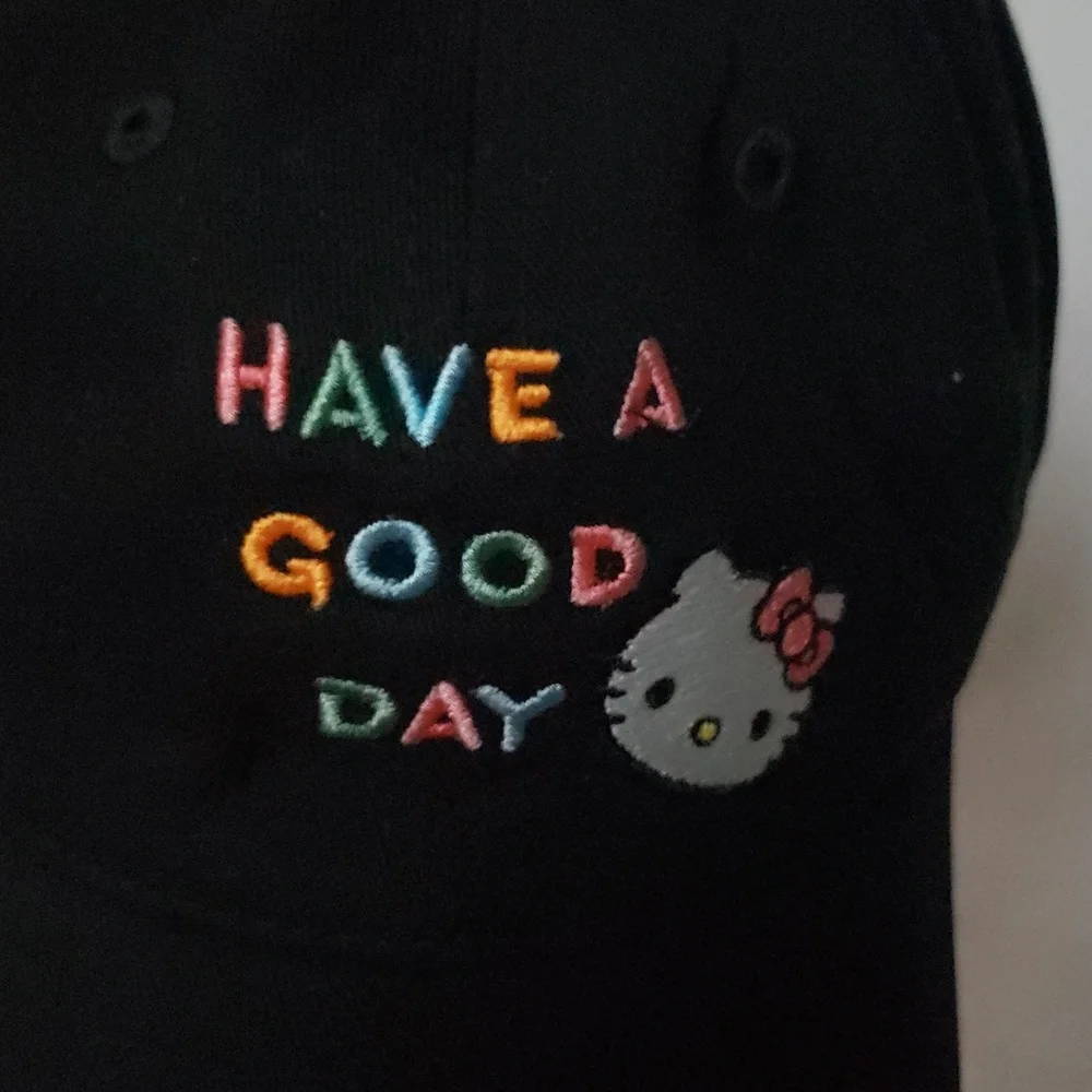 Hello‎ Kitty Black Cap with Colorful Embroidery. NWOT.